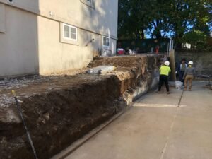 Retaining Wall Leaning? Causes, Risks, and Repair Solutions